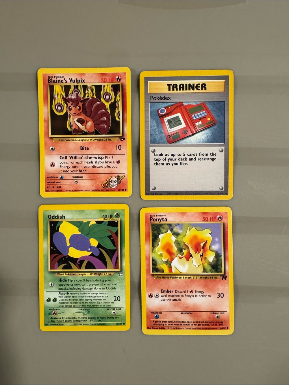 A collection of early Pokémon TCG cards from the 1990s and early 2000s. Set of 4